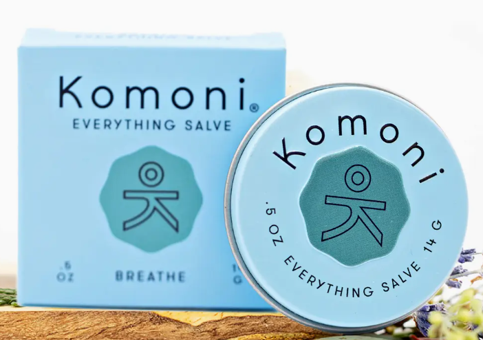 Komoni Breathe Salve metal tin with square box packaging.